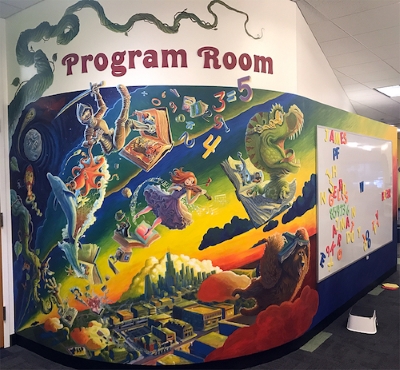 A mural in the DGPL Youth Services Room with illustrations of characters and settings from books
